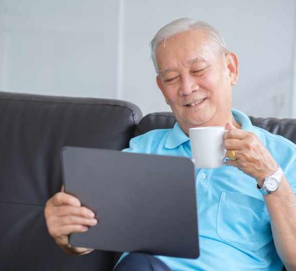 happy-senior-man-using-online-techology-2022-04-07-00-39-54-utc